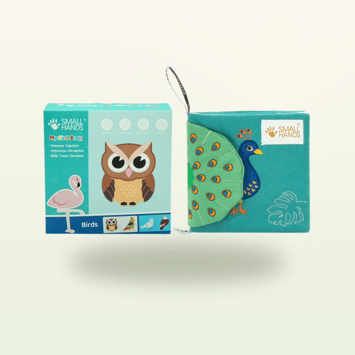 Small Hands Birds Montessori sensory book – packaging with owl motif and cloth book with peacock on a soft cream background – from 0 months