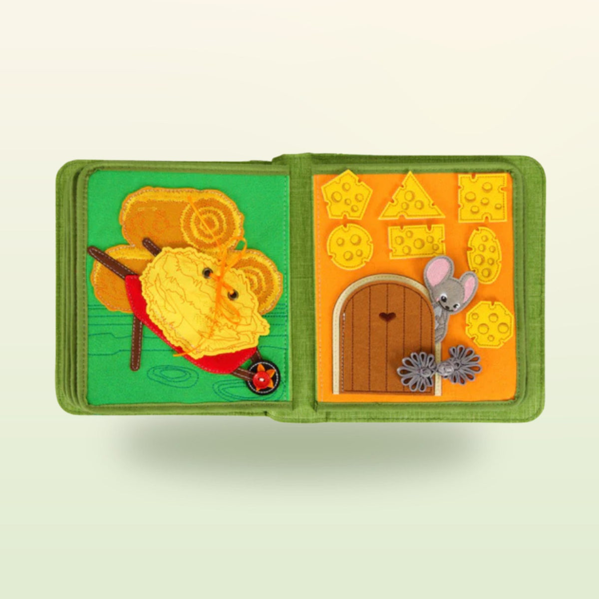 Farm quiet book page: mouse at a door with cheese shapes to match and wheelbarrow with hay – on a soft meadow background