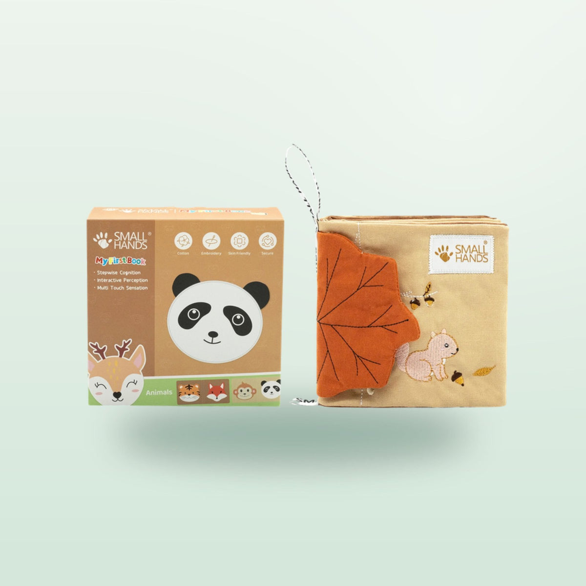 Small Hands Wild Animals sensory cloth book with packaging on a soft forest green background – from 0 months