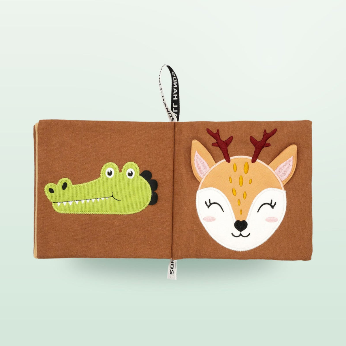 Small Hands Wild Animals sensory cloth book double page with crocodile and deer on a soft forest green background – from 0 months