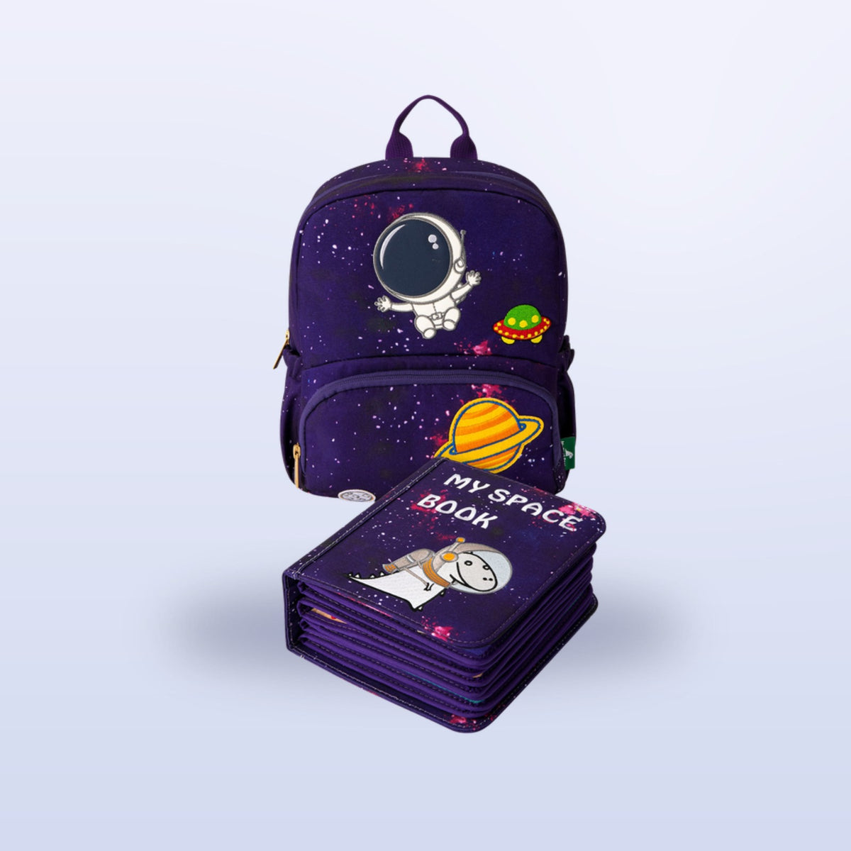 Closed space felt quiet book with dino astronaut on the cover and matching galaxy backpack on a soft space background – set from 3 years