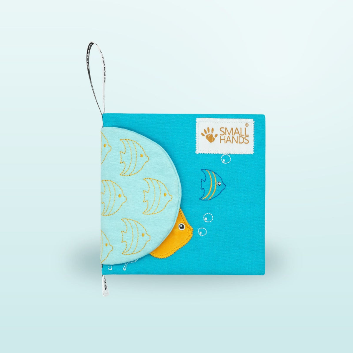 Small Hands Sea Animals Montessori cloth book cover front view on a soft underwater blue background – from 1 year