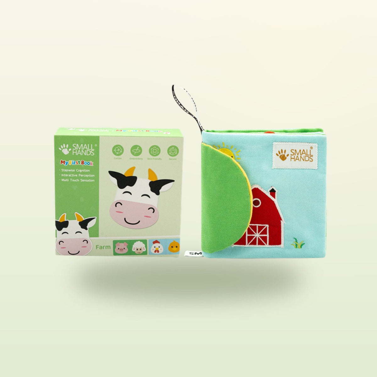 My First Book Small Hands Farm cloth book set with packaging on a soft meadow green background – from 0 months