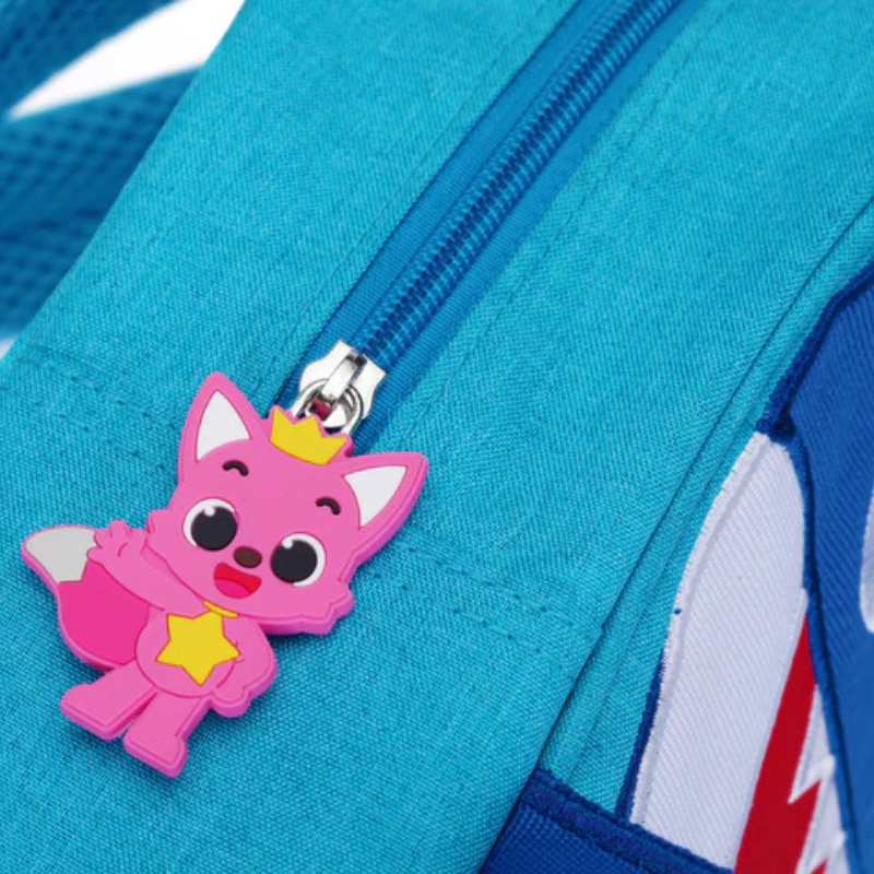 Close-up of the Baby Shark quiet book zip with pink Pinkfong charm – from 3 years