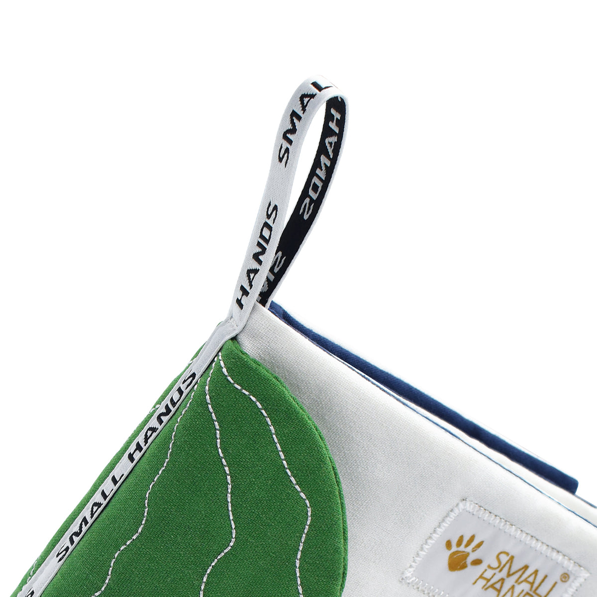 Close-up of the hanging loop on the outside of the book for attaching it to a stroller