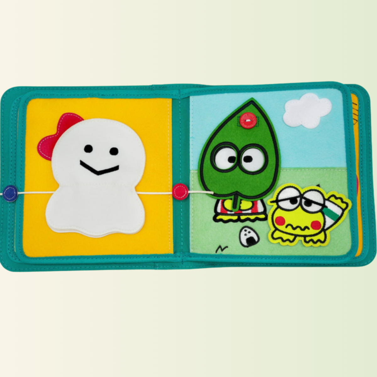 Keroppi quiet book – lacing and weather, cut out on a soft meadow background