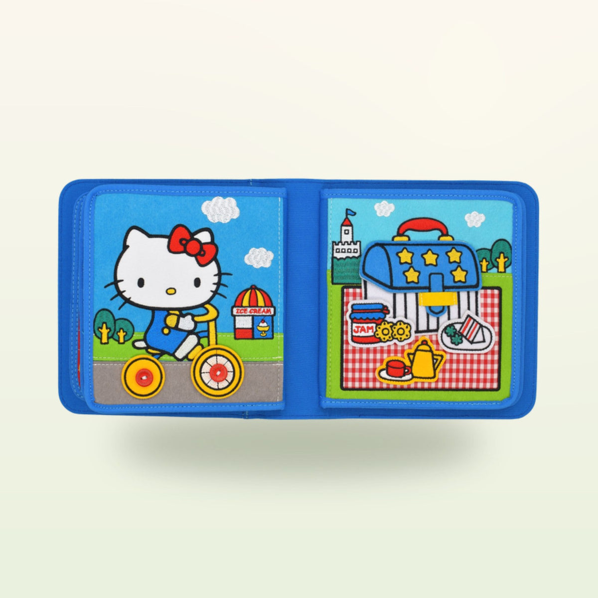 Hello Kitty quiet book scooter double page on a soft cream background – from 1 year