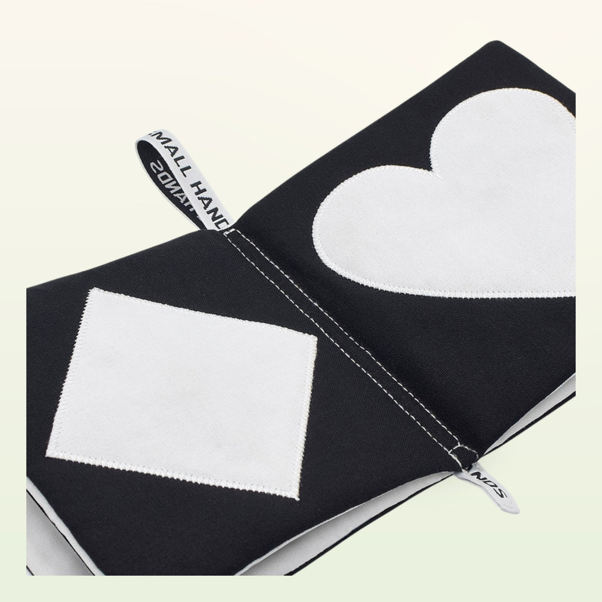 Small Hands Shapes contrast book open – white square and large heart on a soft cream background – from 0 months