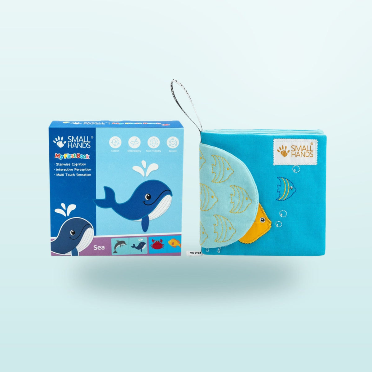 Small Hands Sea Animals Montessori cloth book with packaging on a soft underwater blue background – from 1 year