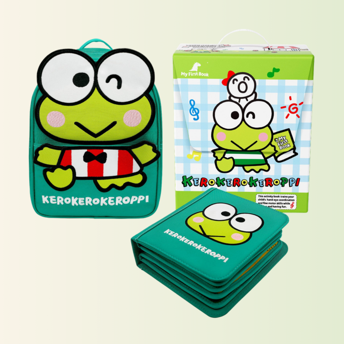 My First Book Keroppi complete set: quiet book, backpack and gift box, cut out on a soft meadow background