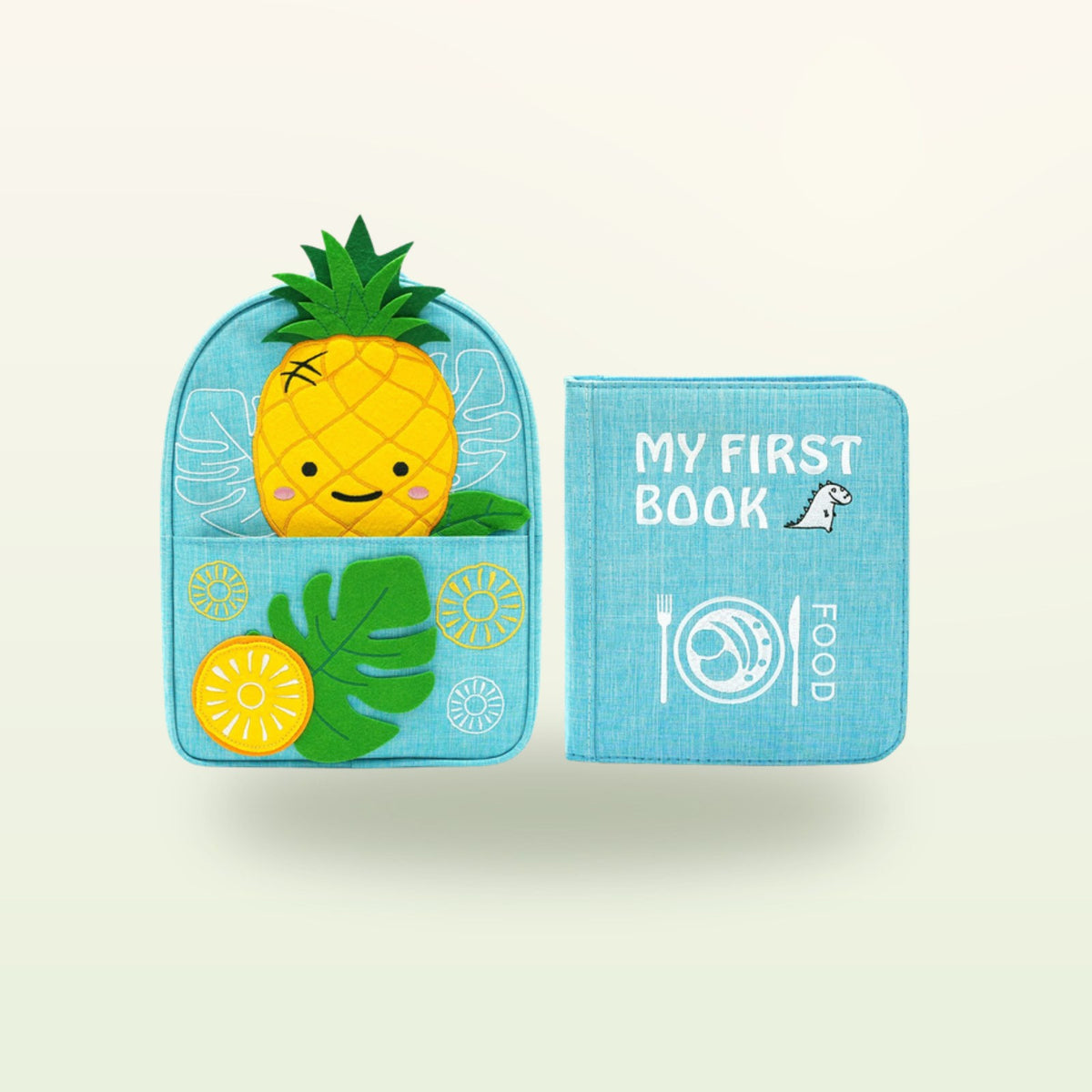 Little Foodies Montessori quiet book with matching pineapple backpack on a soft cream background – from 1 year