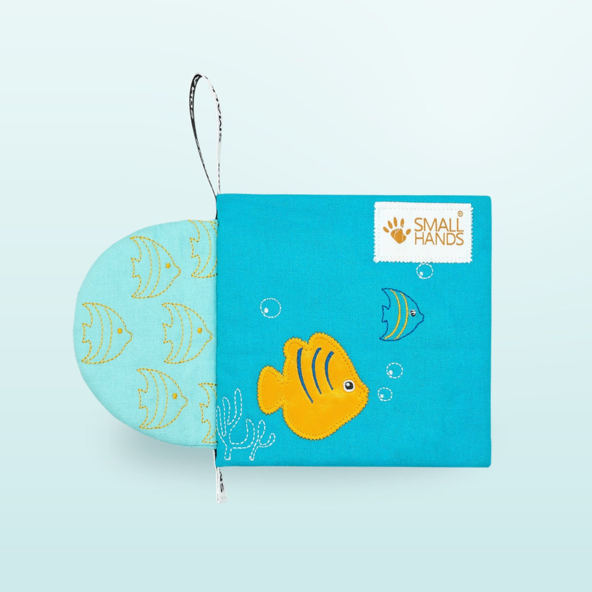 Small Hands Sea Animals Montessori cloth book cover with fish on a soft underwater blue background – from 1 year