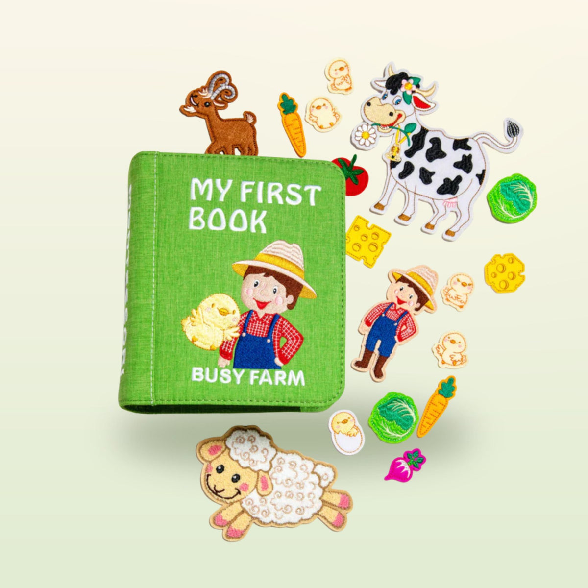 Busy Farm quiet book – overview of all fabric pages and play elements on a soft meadow background