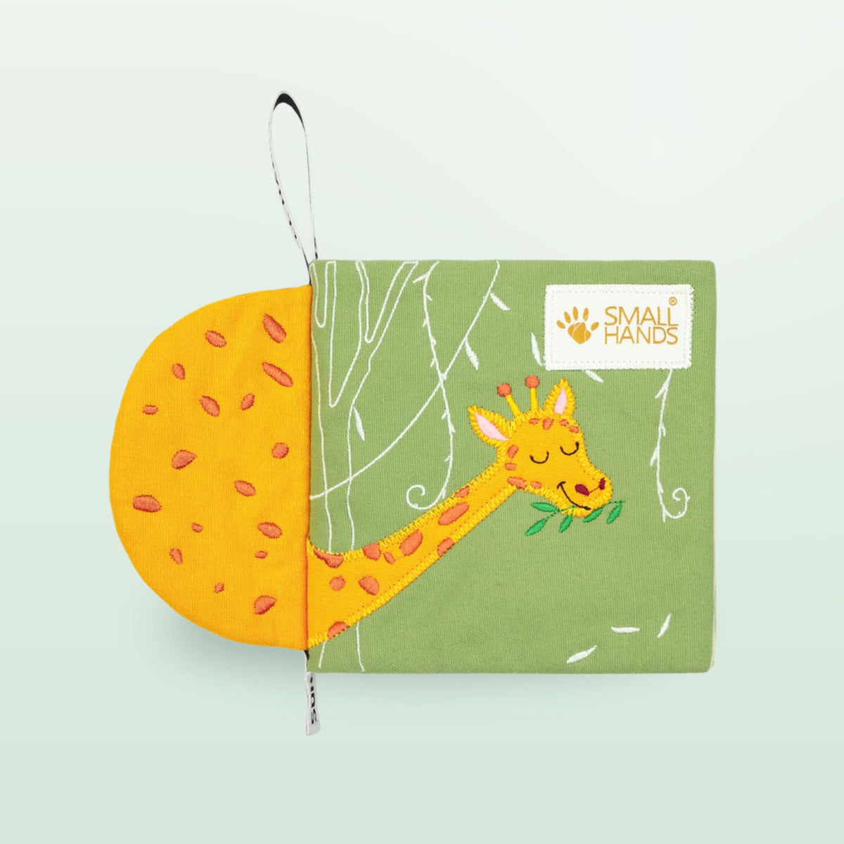 Small Hands Animals of Africa Montessori cloth book cover with giraffe on a soft forest green background – from 0 months