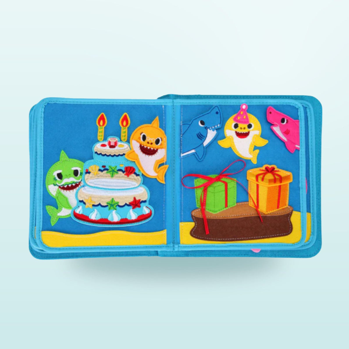 Baby Shark quiet book double page with the shark family birthday party with cake, candles and presents on a soft sea background – from 3 years