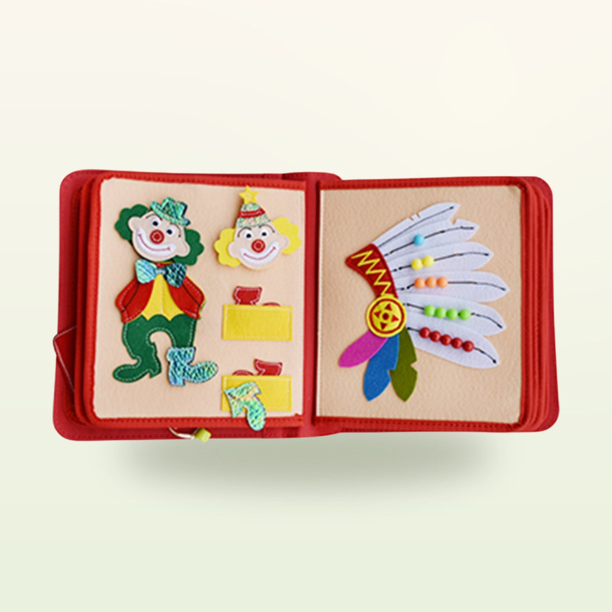 Circus Adventure quiet book double page with two clowns and feather headdress with counting beads on strings on a soft cream background – from 3 years