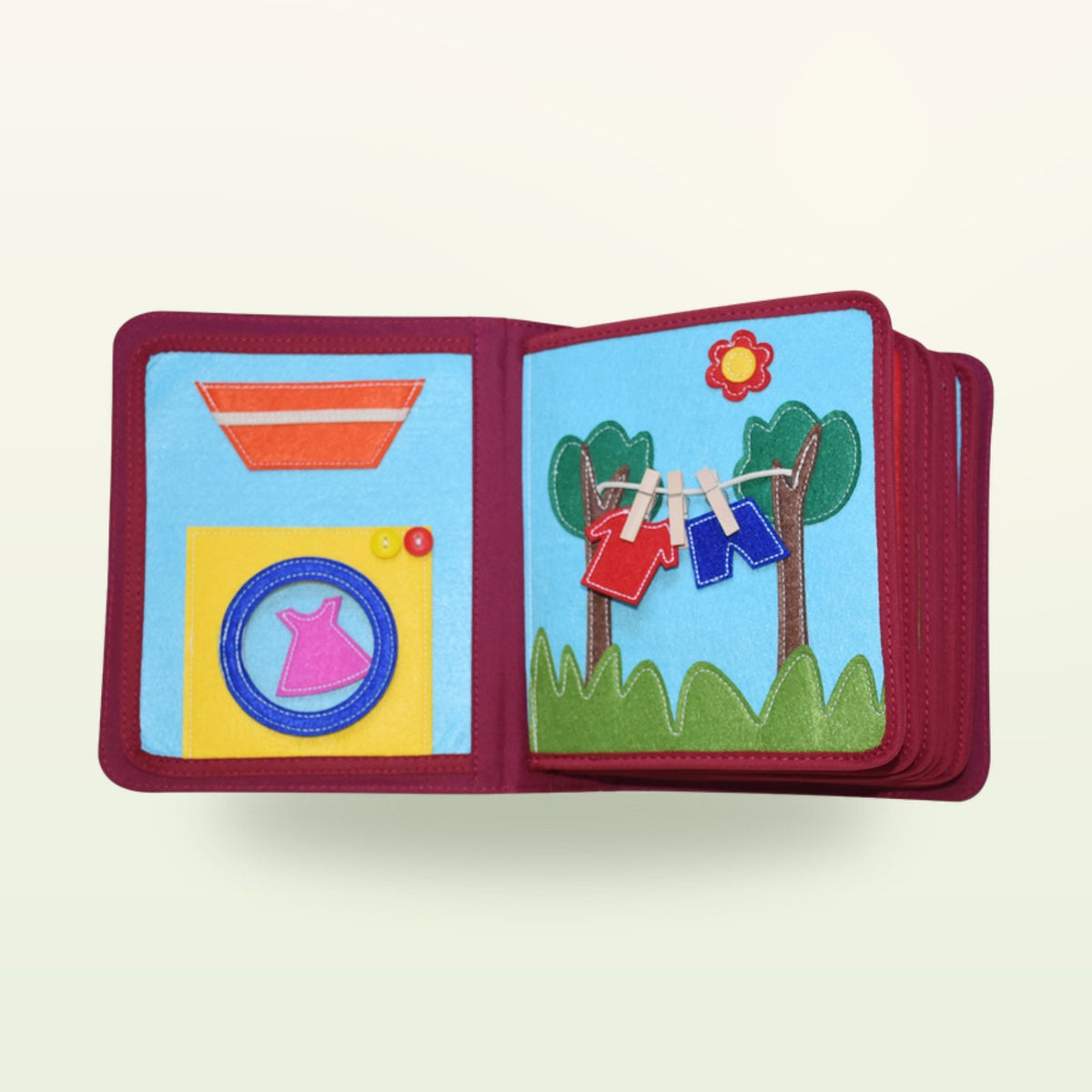 My Everyday quiet book laundry double page with washing machine with buttons and washing line with pegs on a soft cream background – develops fine motor skills from 1 year
