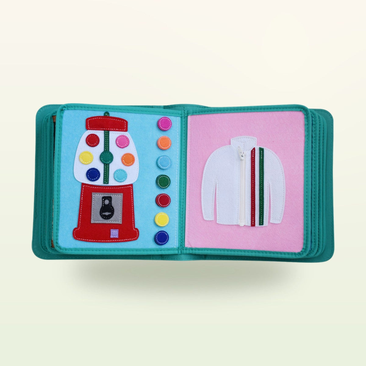Dressing book fabric page with gumball machine for colour matching and white jacket with zip on a soft cream background – from 3 years