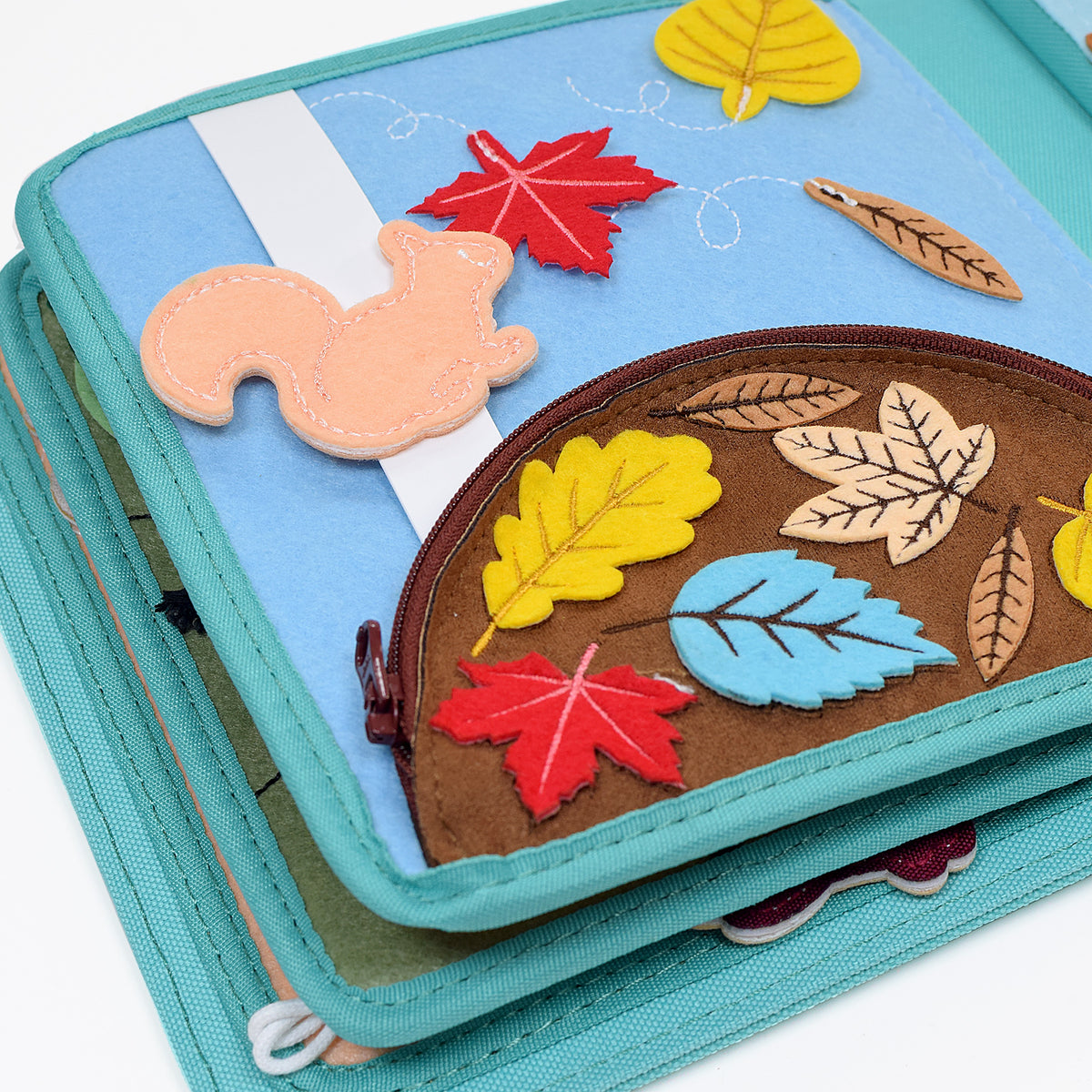 Nordic Forest quiet book page with colourful leaf shapes as a matching puzzle – from 1 year