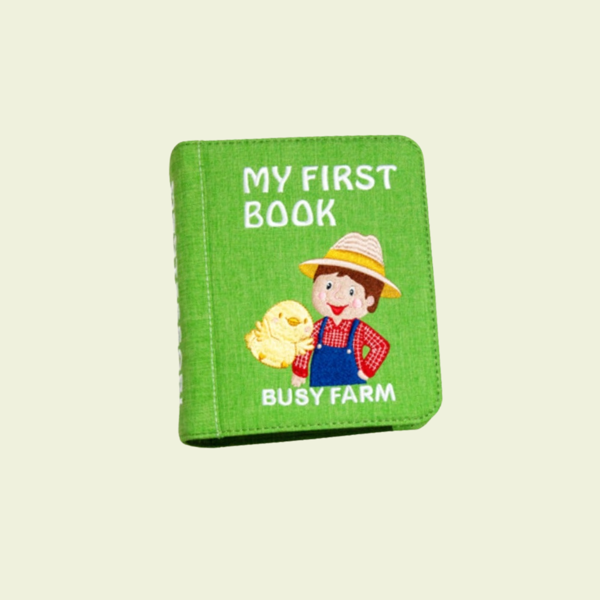 My First Book farm quiet book – closed book with farmer and chicks on a soft meadow background